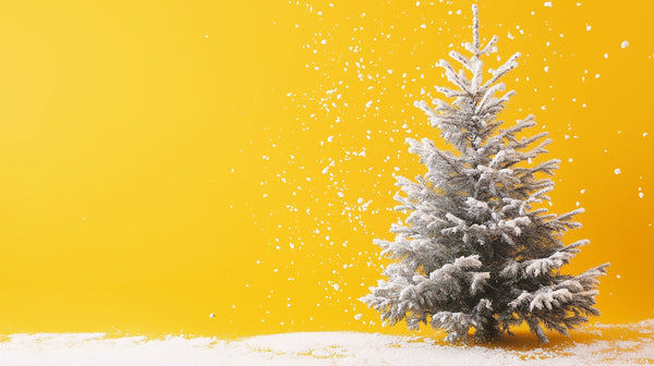 White Christmas tree against yellow background and snowflakes falling Filmmaking Planner 