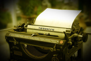 Old fashioned script writer with paper 