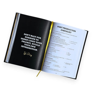 Open book with a black page featuring a quote and a white page with a checklist on a white background