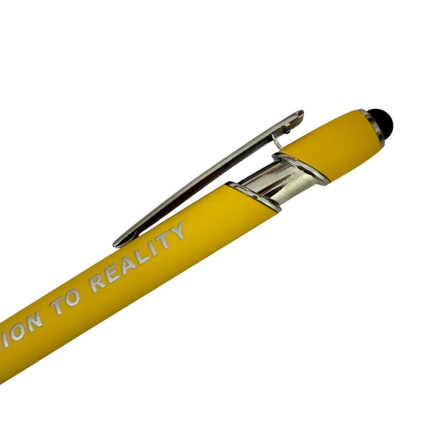 Yellow pen with metal clip and stylus tip on a white background