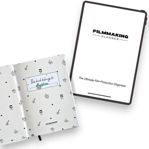 Filmmaking planner with cover and open pages on a white background